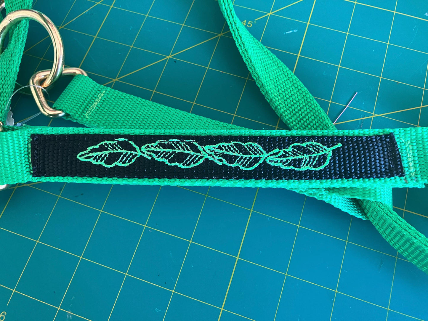 Custom embroidered horse halter leaf pattern, lime green with black overlay with green leaves, gold hardware
