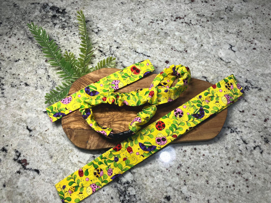 Bright yellow spring bug dog collar cover, cute dog scrunchie with spring colors and insects, bold handmade collar sleeve